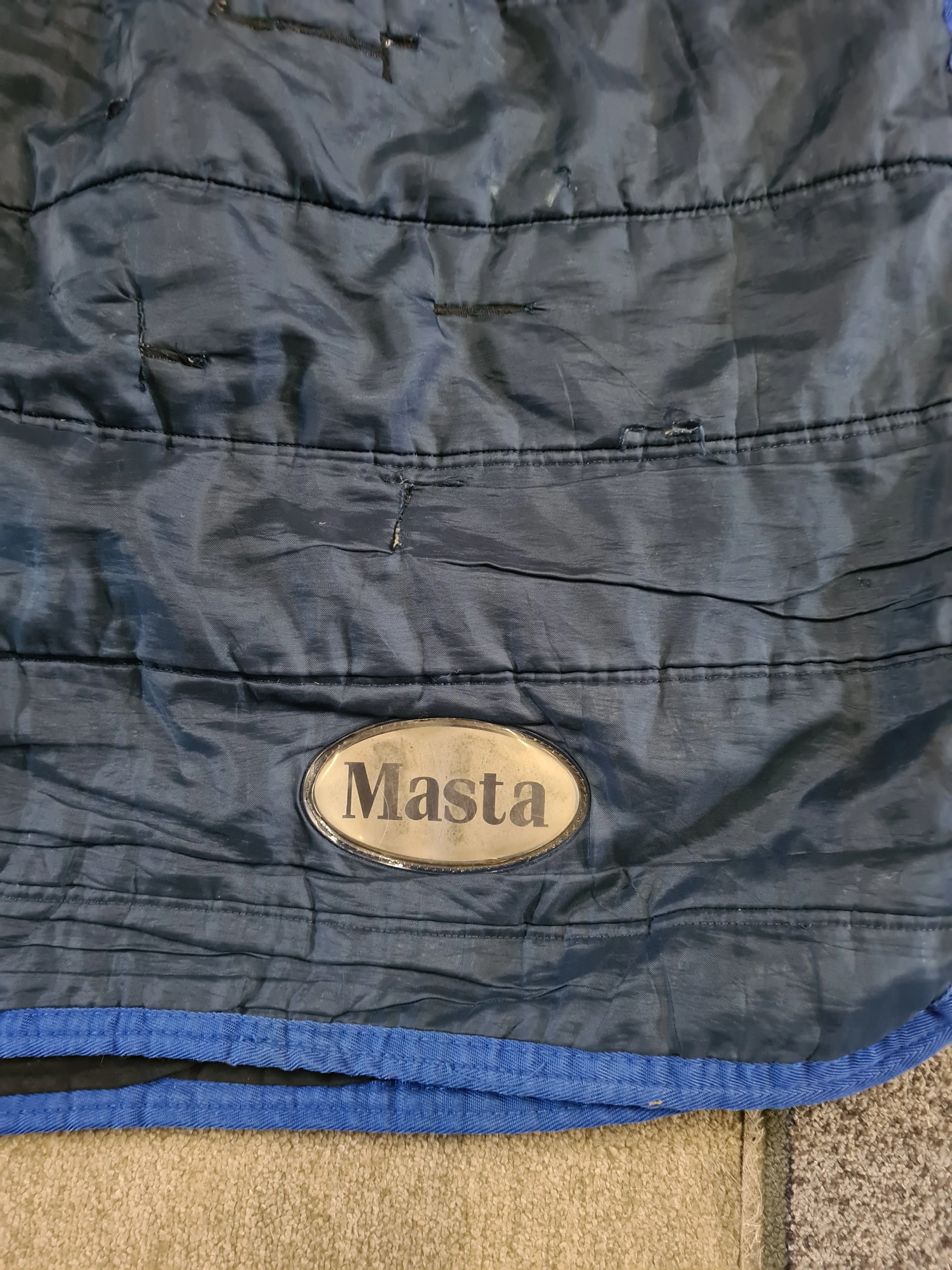 5'9 masta black and blue med stable rug, few tears and repairs as pictured
