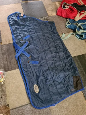 5'9 masta black and blue med stable rug, few tears and repairs as pictured