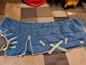 6'6 Blue checked rhinegold medium weight half neck stable