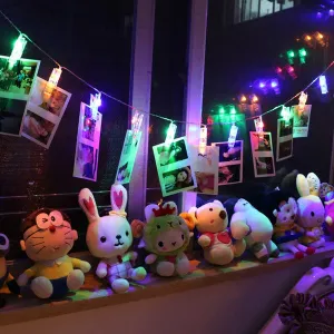 Awesome LED Photo Clips String lights on 15 Feet of flexible wire with timer, warm white. Enhance any space with your favourite pics, clippings, notes or cards!