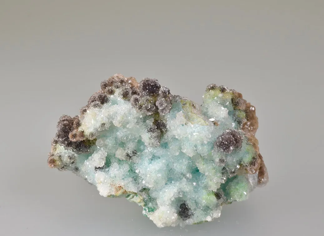 Calcite on Chrysocolla, Zacatecas, Mexico, Mined c. late 1970's, Ron Roberts Collection MX-14, Miniature 3.5 x 4.0 x 7.0 cm, $45.  Online  9/5.