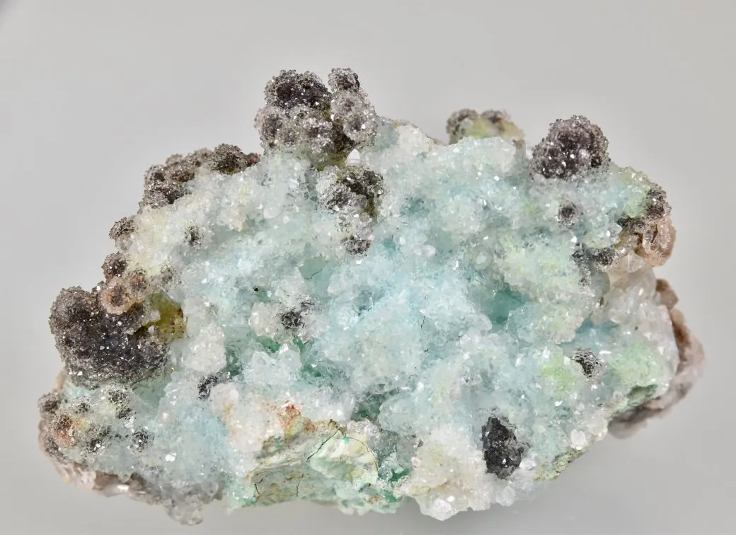 Calcite on Chrysocolla, Zacatecas, Mexico, Mined c. late 1970's, Ron Roberts Collection MX-14, Miniature 3.5 x 4.0 x 7.0 cm, $45.  Online  9/5.