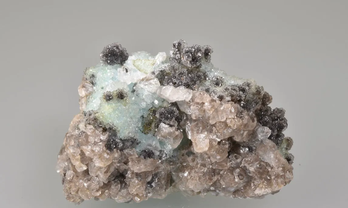 Calcite on Chrysocolla, Zacatecas, Mexico, Mined c. late 1970's, Ron Roberts Collection MX-14, Miniature 3.5 x 4.0 x 7.0 cm, $45.  Online  9/5.