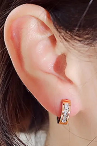 Children's and Teens' Earrings:  Surgical Steel Rose Gold IP Huggies with AAA Clear CZ